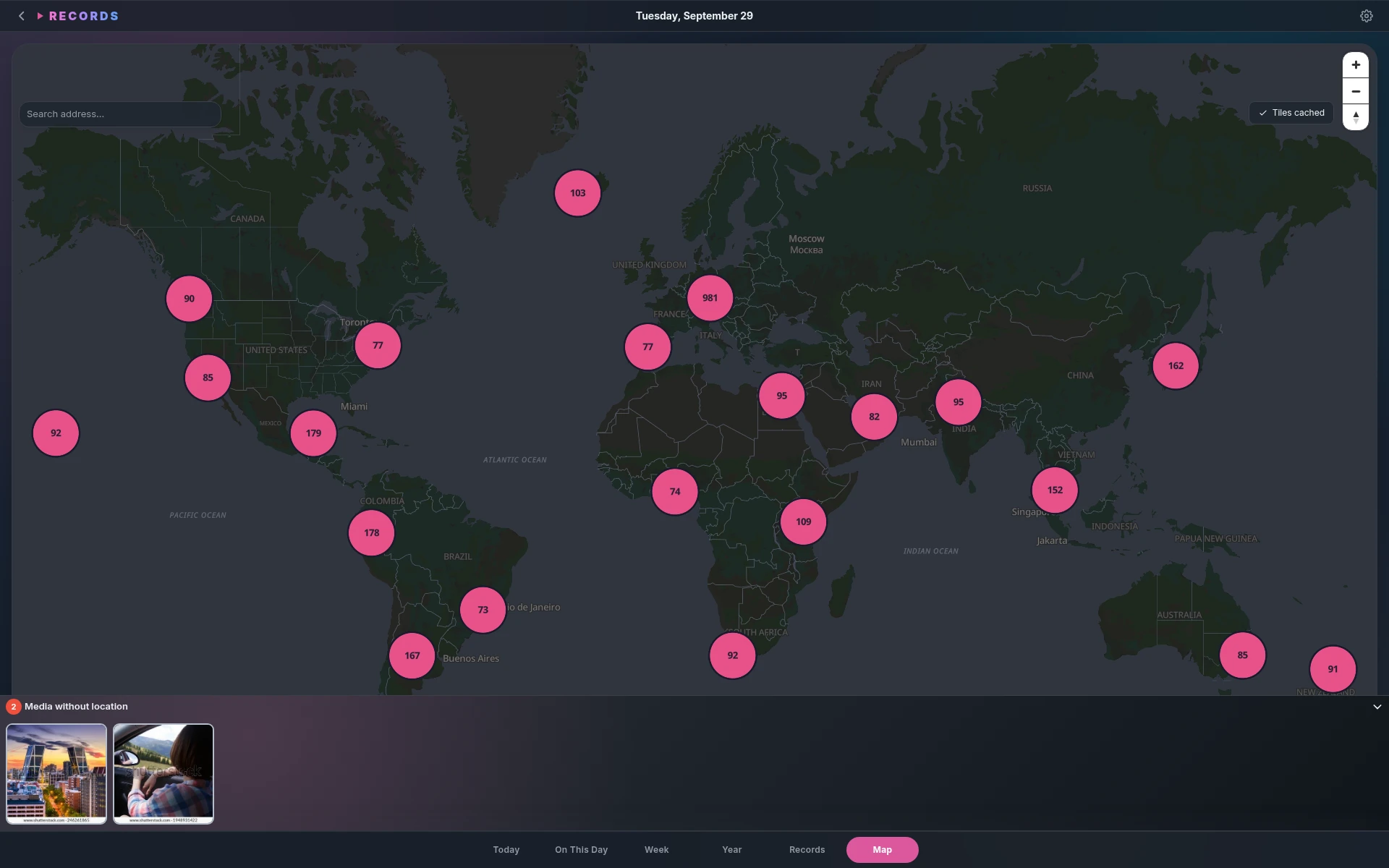 Records private world map with photo clusters